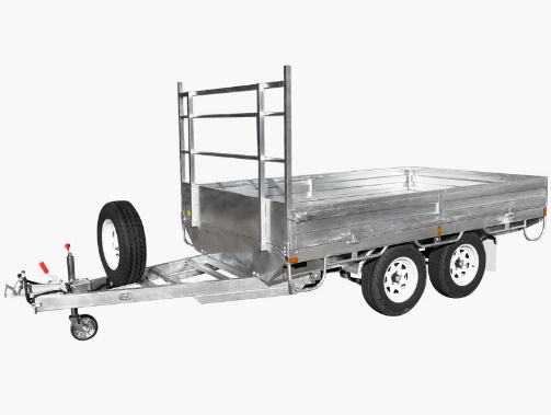 Large flat top trailer showing deck and tandem axle